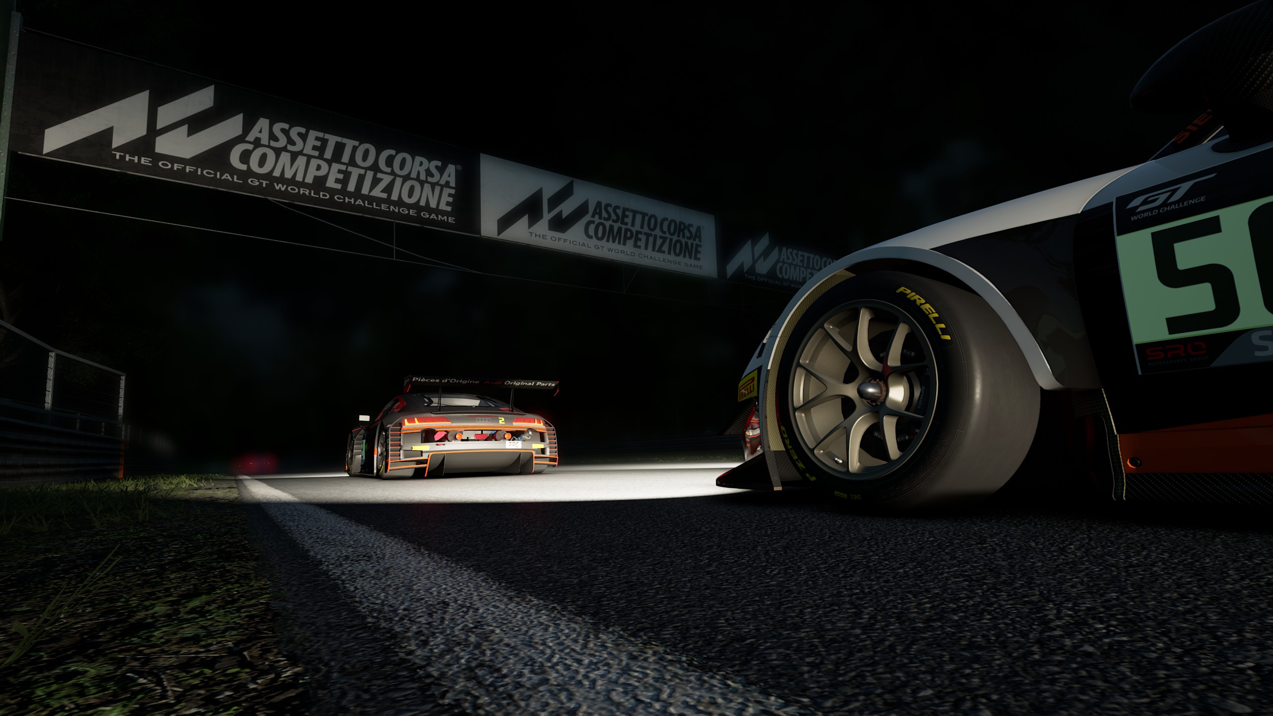 Pirelli tire on white Ferrari 458 GT3 under the Assetto Corsa Competizione board.